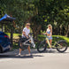 A man takes out folded kingbull Ebike Verve from the trunk of the car